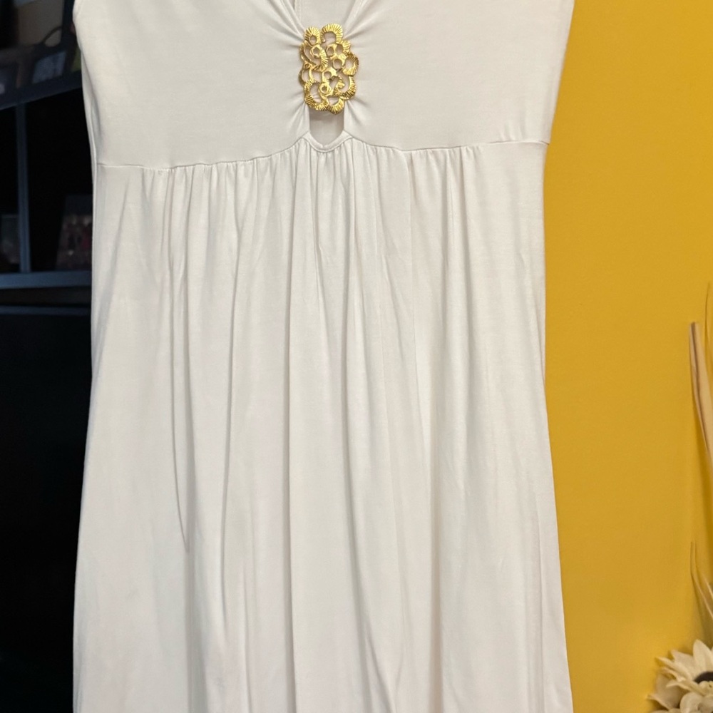 Trina Turk Cream Dress with Subtle Gold Detail Swimwear Collection Cover